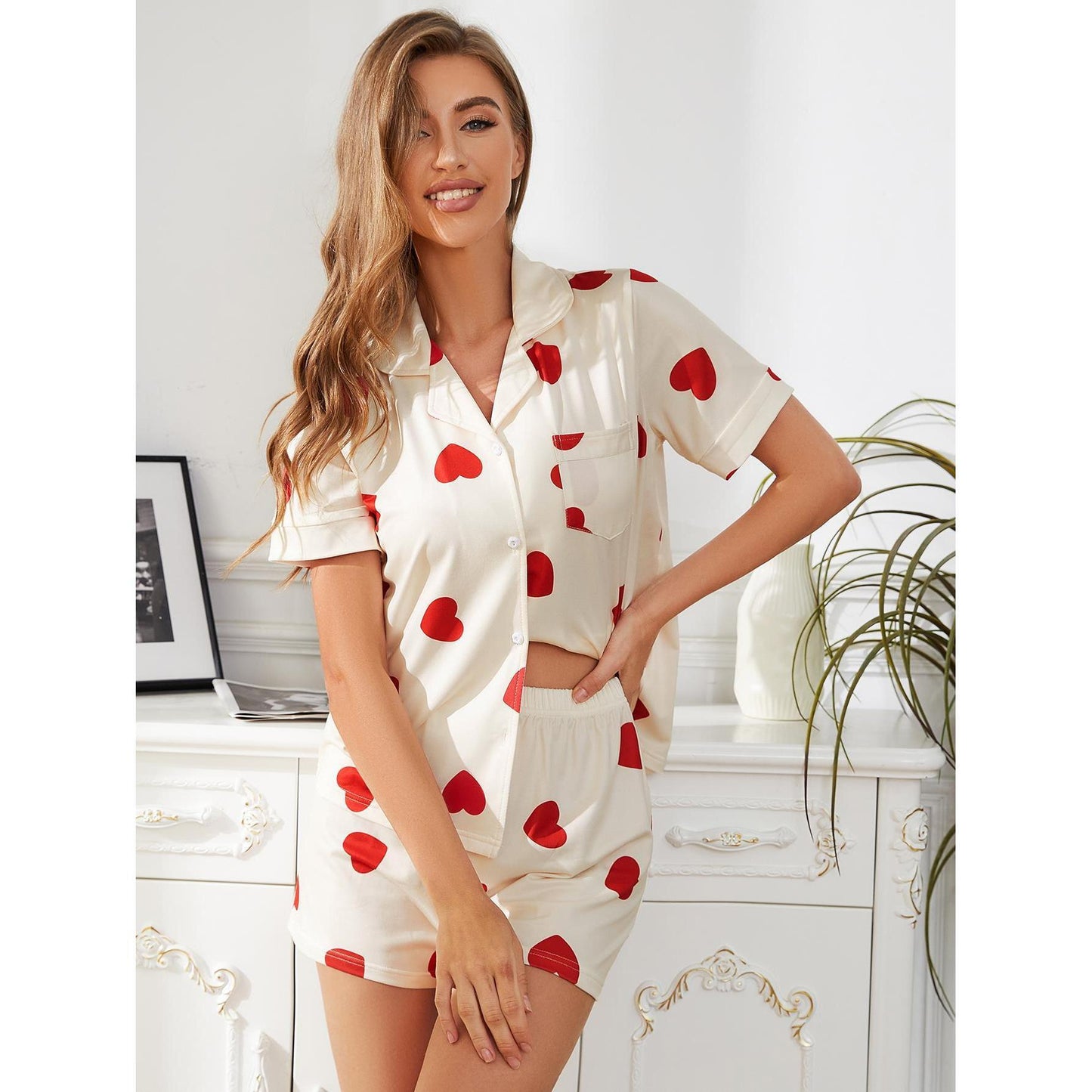 Pigiama completo con pantaloncini a maniche corte con dettagli tascabili